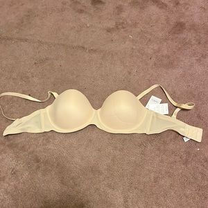34DD bra, adjustable straps, can be made into racer back or strapless bra